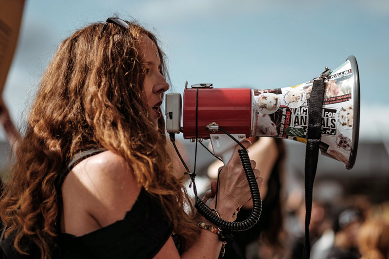 woman on bullhorn word of mouth
